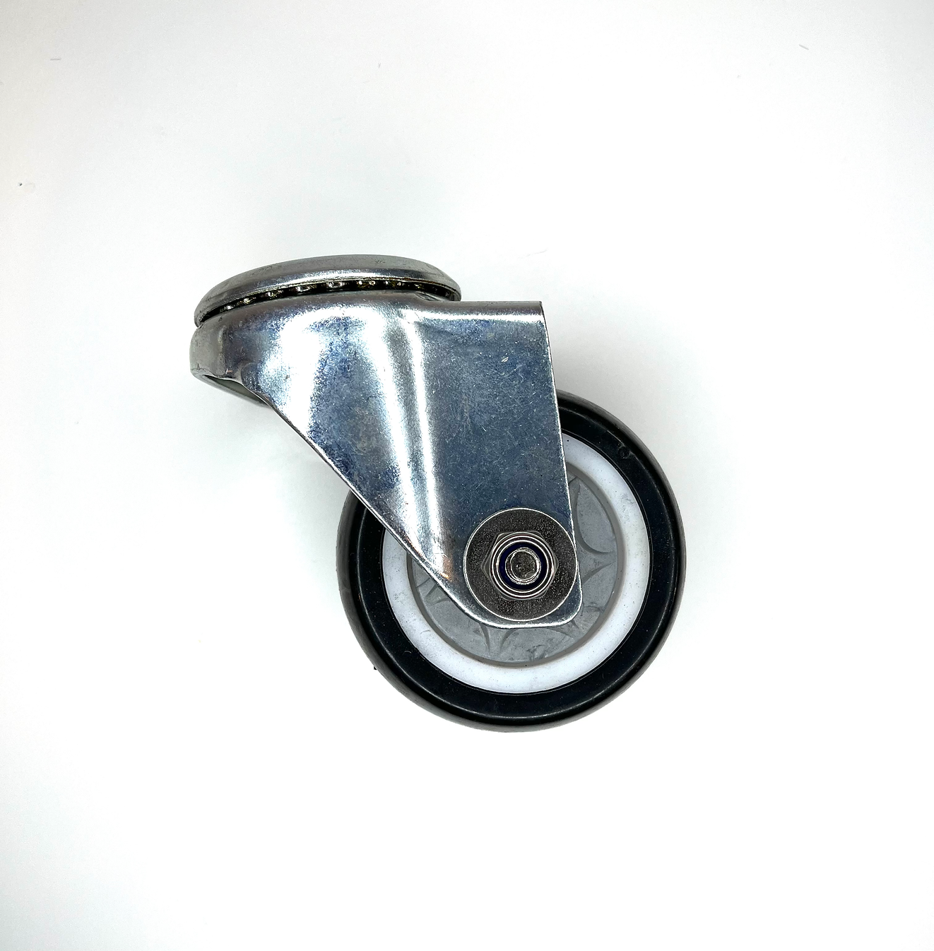 universial wheel behind squeegee assembly for floor scrubber